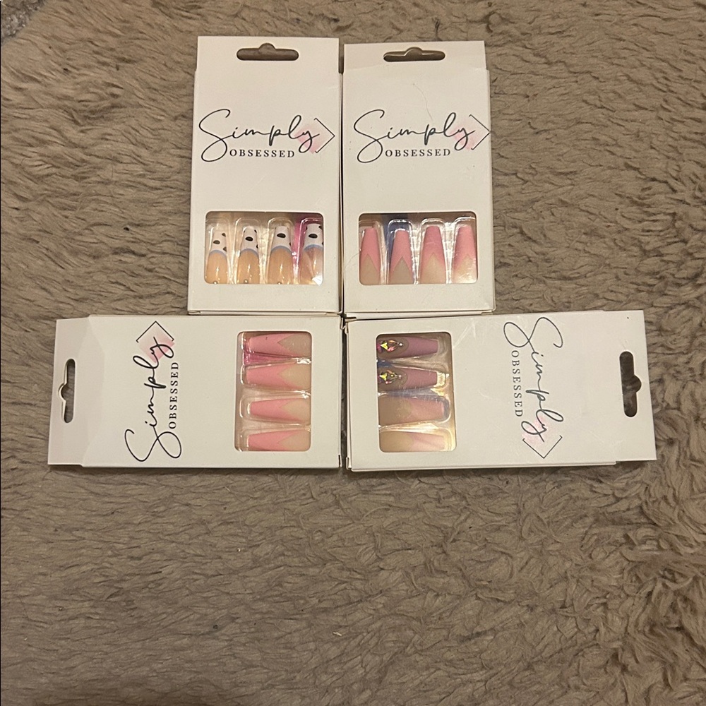 4 packs of Simply Obsessed Nail Set Collections
New in packaging